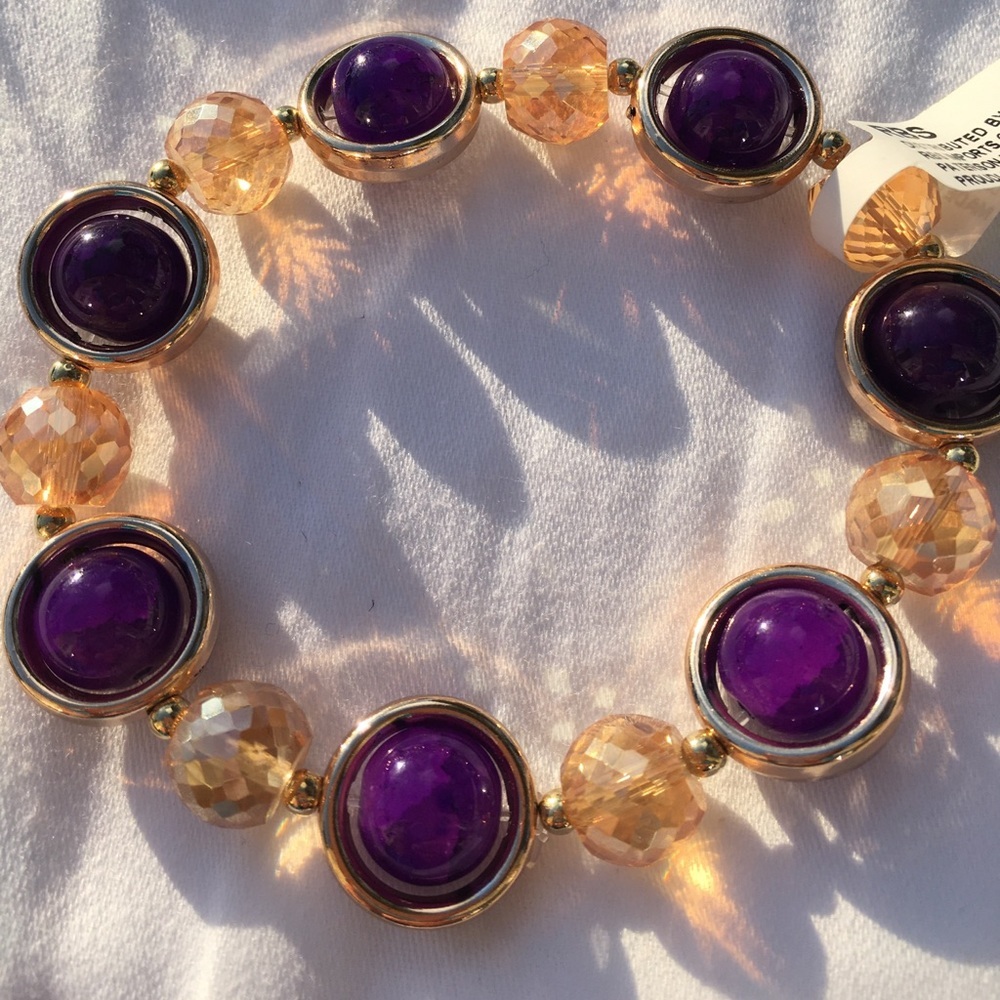 Bracelet dark purple and goldfish colored …